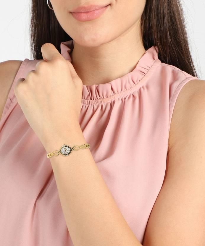 Titan Raga Women’s Analog Watch – Elegant Gold Bracelet Design